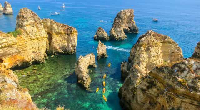 Kayaks along the rocky coast