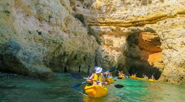 Kayak tour through an arch