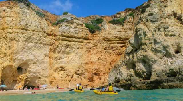 Kayaks accessing a beach close to Lagos.