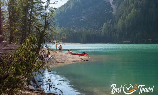 Visitors are taking a bath in the lake or sun bath