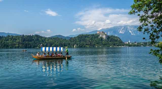 Rowing boat with group of people