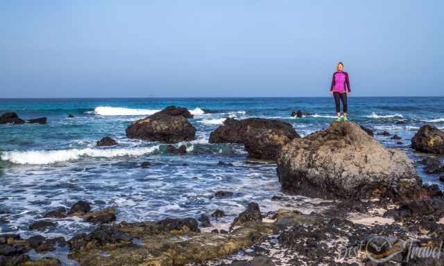 Me standing on a rock at one of the beaches at Malpais de Corona