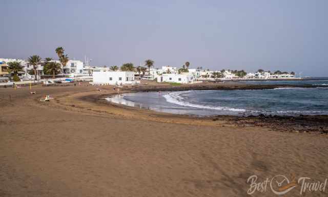 Playa Honda beach and sunbathers