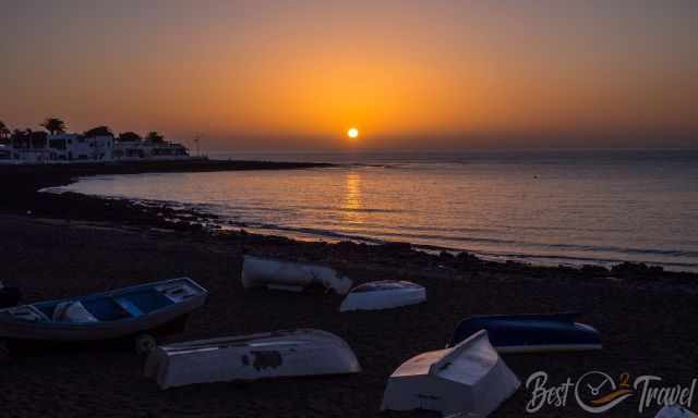 Sunrise at Playa Honda - Beach with fishermen boats