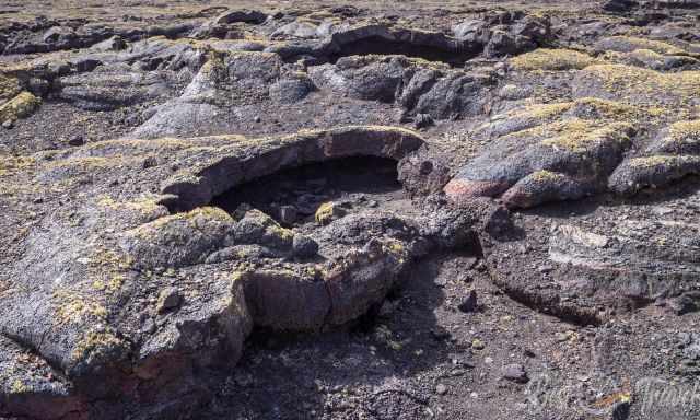 Cracks and holes beneath the lava surface