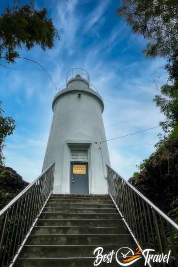 The White Lighthouse is shimmering in front of the blue sky.