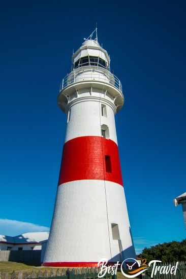 The red and white Low Head Lighthouse