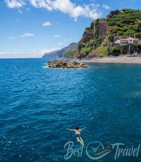 A swimmer in the bay of Ponta do Sol