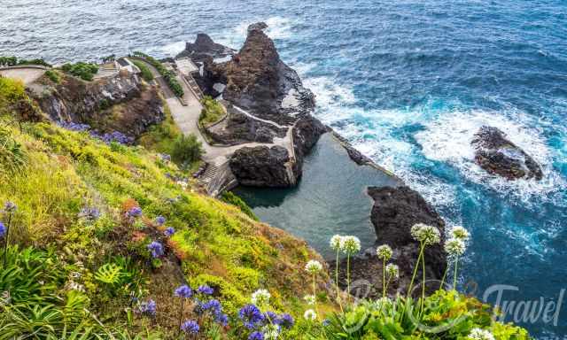 View from the cliff top down to Seixal pools