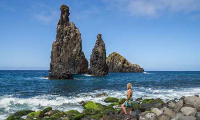 Me at Praia da Ribeira da Janela in front of the rock stacks