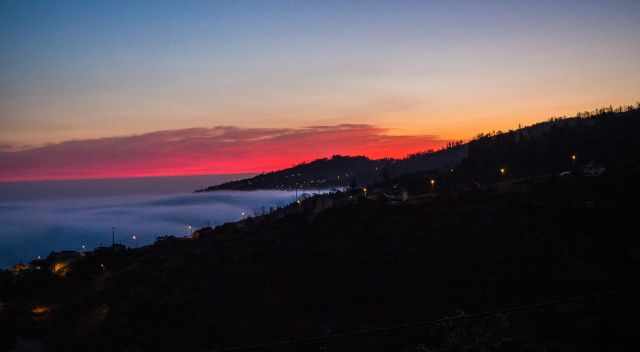 Spectacular pink sunset in Madeira caused by sand from the Sahara