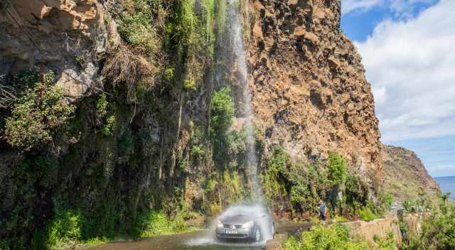 Car wash under the waterfall Anjos Ponta do Sol on the old R101