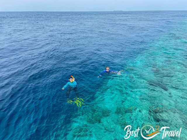 The shallow reef to the right and the deep blue sea left.