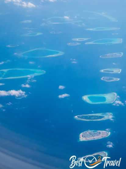 View from the plane to several islands in the Maldives.