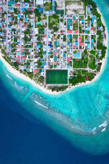 A drone shot of a typical Maldivian Island