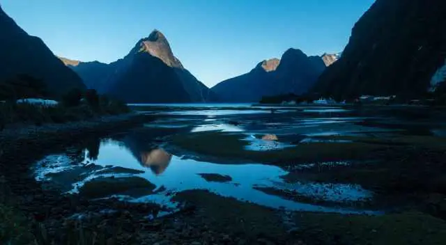 Milford Sound - Mitre Peak reflects in the water