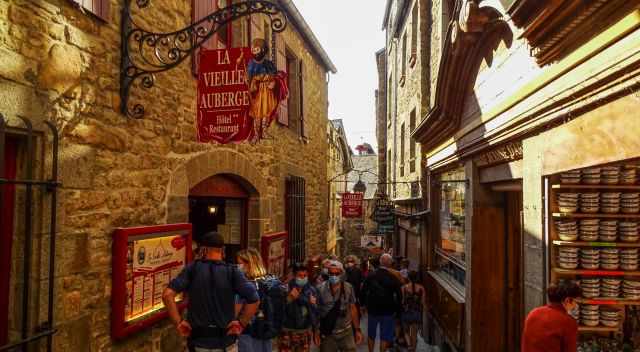 The main street "Grand Rue" busy during the day.