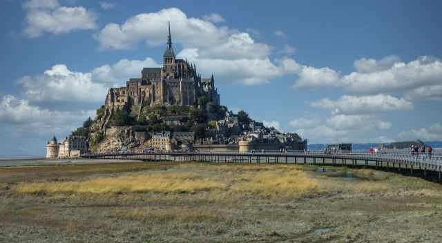 Mont Saint Michel on a partly cloudy day in spring