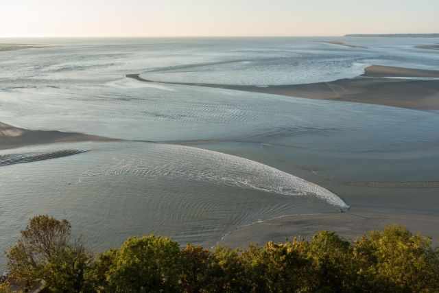 The first wave, the tidal bore rolling in with power.