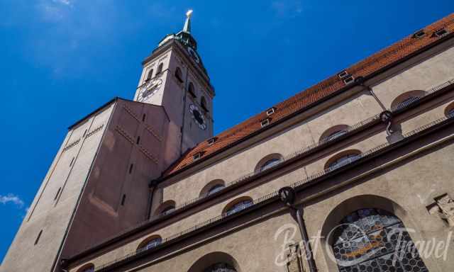 People walking on the top of the tower at Peterskirche