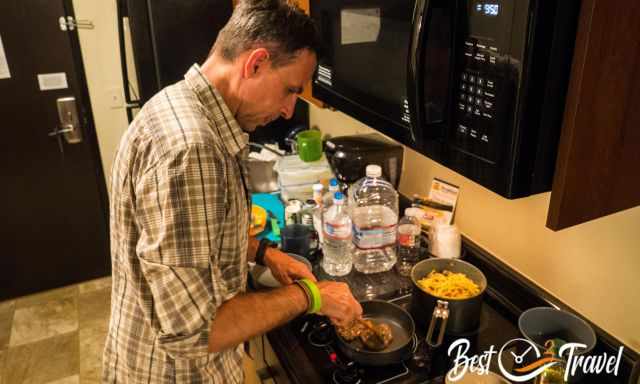 Cooking in the kitchenette in the hotel.