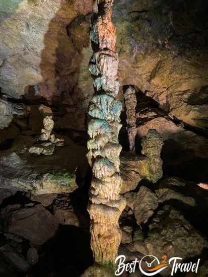 A huge stalagmite in Nebelhöhle illuminated