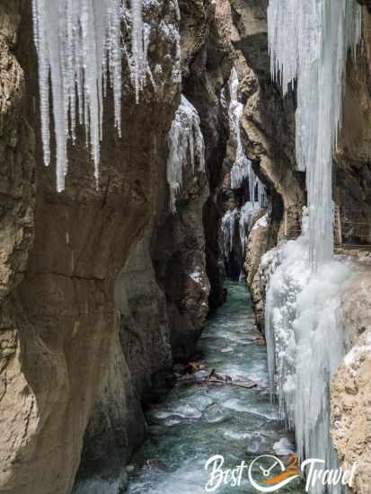 The emerald-green Partnach torrent full of icicles.