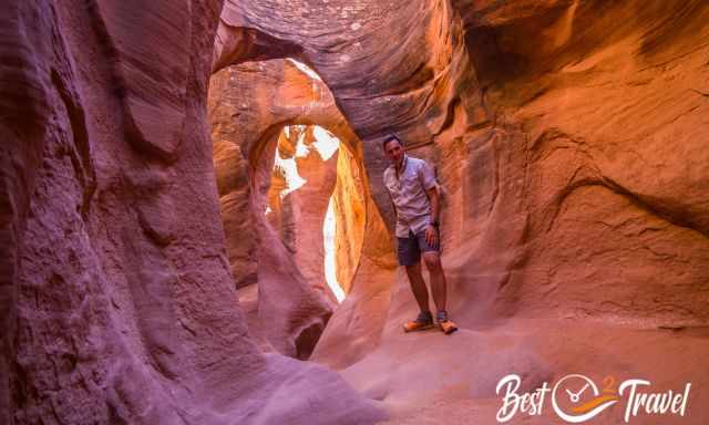 The fabulous light in Peek-A-Boo lets the canyon and hiker glow.
