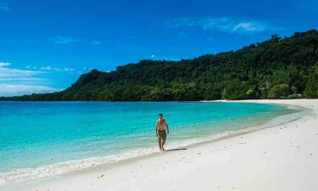 One of the crystal emerald blue beaches in Vanuatu