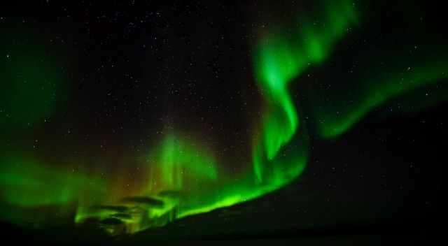 Spectacular northern polar lights in green - aurora borealis