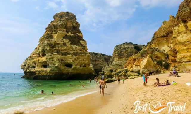 Walking along Praia da Marinha 