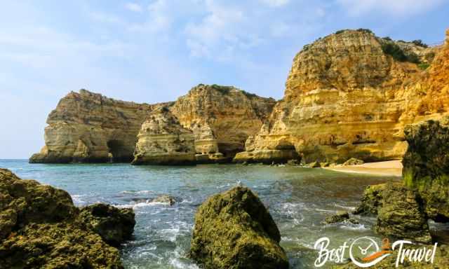 View from the sea to Praia da Marinha and to rock arches