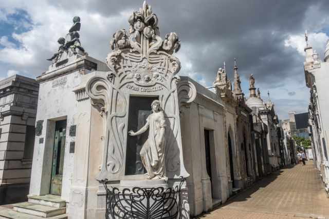 The marble statue and the mausoleum of Rufina Cambaceres Bacichi