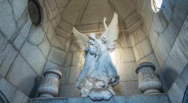 Marble angels in a mausoleum.