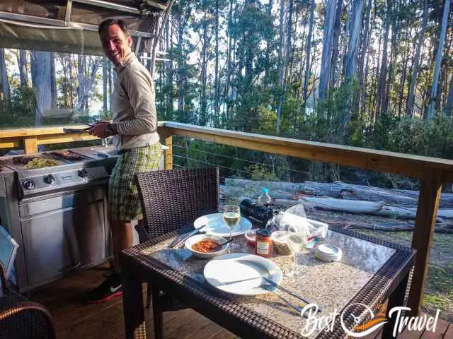 A man cooking on a gas bbq