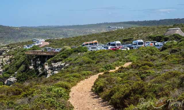 The parking at the entrance gate is overcrowded.