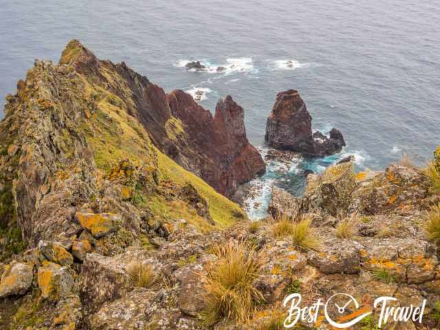 The sheer cliffs and drop and the red rocks at Rosais.