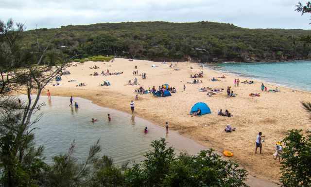 Crowded Wattamolla Beach at weekend.