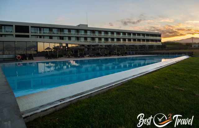 The Hotel Pedras do Mar with large pool at sunset