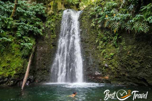 A swimmer in the pool of Salto do Prego waterfall.