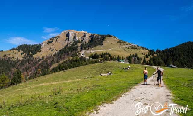 Schafberg and two hikers on the path