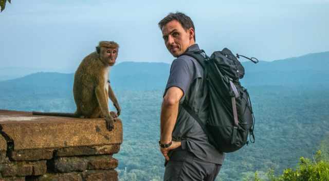 My husband and a macaque monkey