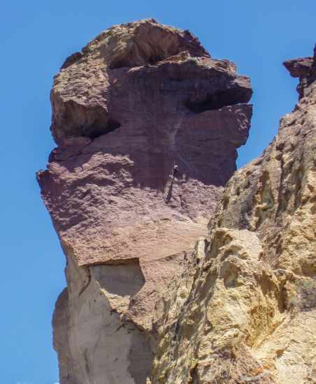 Monkey Face Rock and a climber