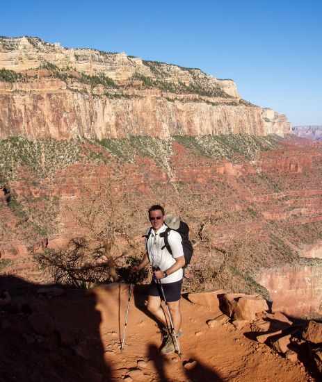 A hiker in short trouser early morning on the South Kaibab Trail