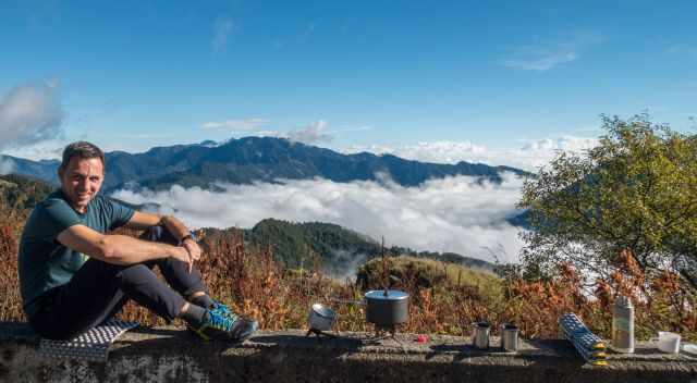 Sitting above the clouds in the sun and boiling water for coffee