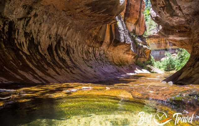 The Subway cave and its unique shape with emerald pools with sunlight.