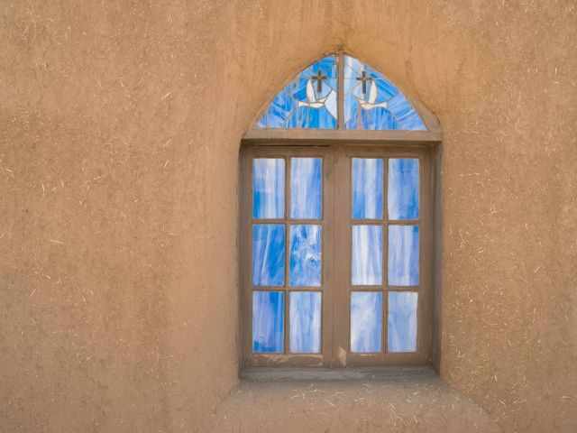 A colourful window in one of the houses