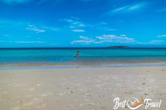 A woman taking a bath at Hazards Beach