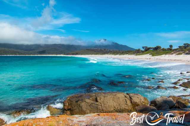 The white sand and the turquoise sea at Wineglass Bay and Beach