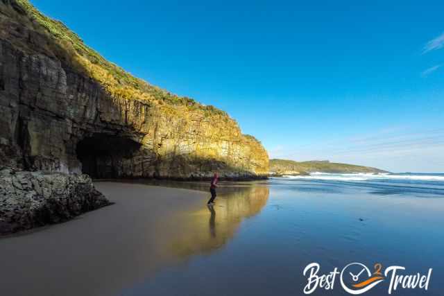 I on the dry and secluded beach behind the cave